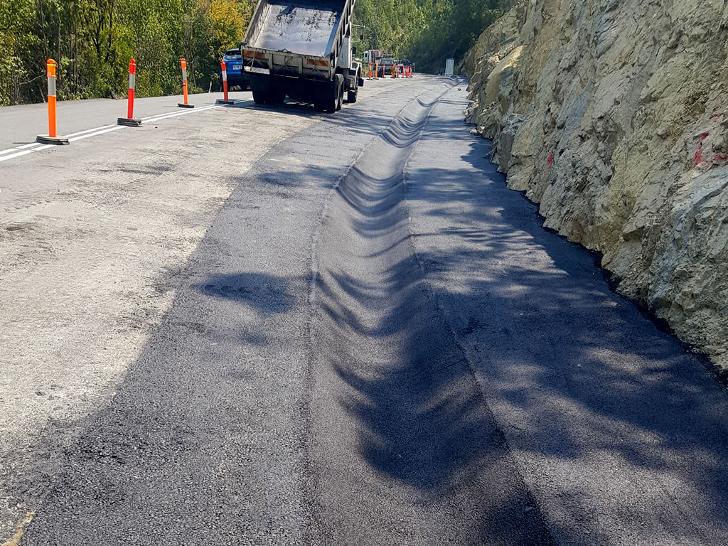 highway asphalt road drainage spoon drain contractor hobart tasmania